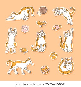 a set of colored stickers of red cats and toys, hand-drawn in a cartoon style.