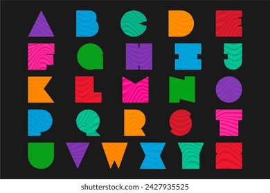 Satz von farbigen Alphabet-Buchstaben auf dunklem Hintergrund