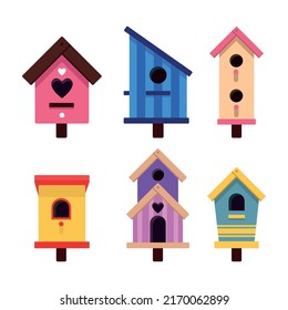 Set of colorful birdhouses in cartoon style. Vector illustration of houses for domestic and wild birds on white background.