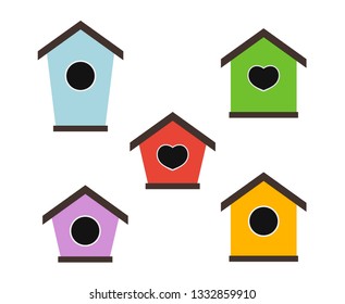 Set of colorful birdhouses. Nesting boxes for birds. Decorative flat vector elements for posters, postcards and banners 