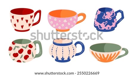 Set of colorful ceramic cups with various patterns like hearts, flowers, cherries and abstract designs. Flat style design. Isolated on a white background.