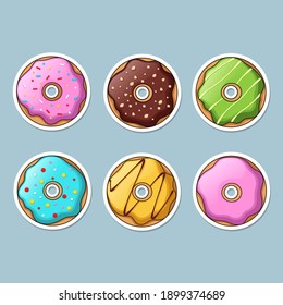 Juego de pegatinas de donuts coloridas. ilustración vectorial