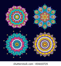 Set of colorful doodle mandalas. Circle lace ornament. Vector hand drawn ethnic floral pattern. Abstract tribal flowers set. Bright elements on dark blue background.