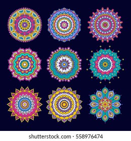 Set of colorful doodle mandalas. Circle lace ornament. Vector hand drawn ethnic floral pattern. Abstract tribal flowers set. Bright elements on dark blue background.