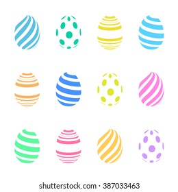 Set of colorful dots and stripes easter eggs, isolated on white background.