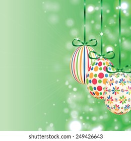 Set of colorful Easter eggs with green ribbons