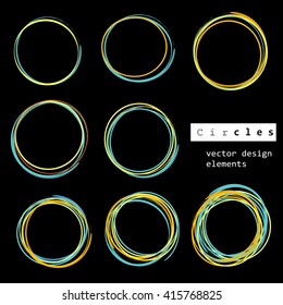 set of colorful empty hand drawn circles isolated on black background. vector design elements