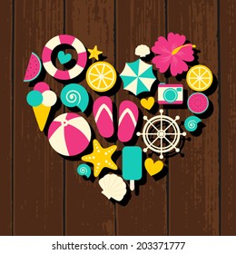 A set of colorful flat design summer travel icons in the shape of a heart on wooden background.