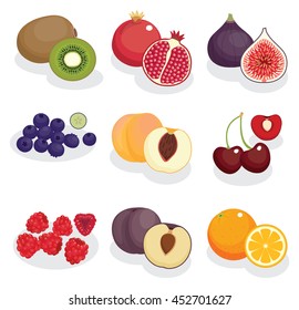 Set of colorful fruits cut in half