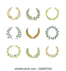 Set of colorful hand drawn silhouette circular laurel foliate and wheat wreaths depicting an award achievement heraldry nobility