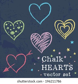 Set of colorful hearts drawn like chalk drawing on grunge chalkboard background.