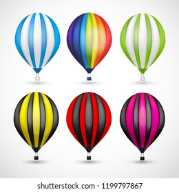 Set of colorful hot air balloons and airship isolated on light background. 