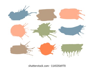 Set of colorful ink splashes and drops made with brush. Blobs and spatters. Collection of elements for design and decoration. Isolated vector illustration
