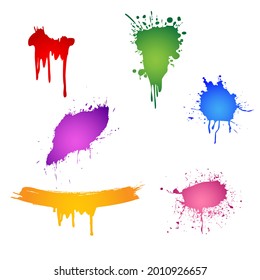 Colorido juego de tintas salpicadas de color verde, rojo, violeta, azul, rosa, amarillo
