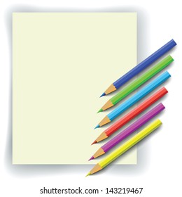 set of colorful pencils and paper for your design
