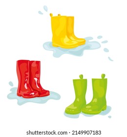 Set of colorful rubber boots in puddle of water. Vector illustration