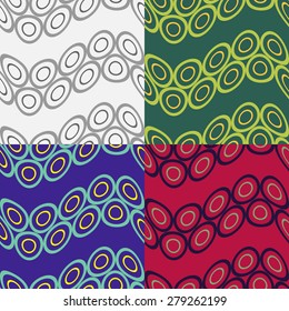 A set of colorful seamless patterns with wavy bands of circles