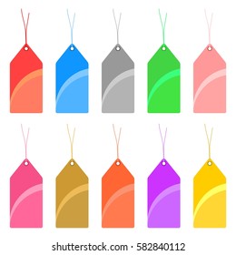 Set of colorful tags with holes and with tied twine on a white background