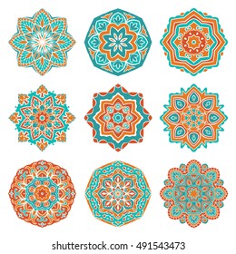 Set of colorful vector mandalas. Collection of stylized round ethnic ornaments. Template for embroidery.  Simple design elements. Turquoise and orange pattern.