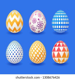 Set of colourful easter eggs isolated on blue background for your design. 
