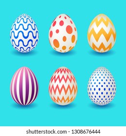 Set of colourful easter eggs isolated on blue background for your design. 