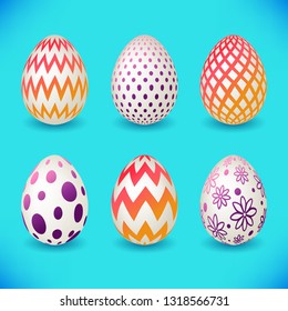 Set of colourful easter eggs isolated on blue background for your design.