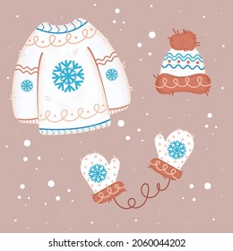 A set consisting of warm winter clothes, such as a sweater, gloves,  and hat. Winter set of clothes for  ribbon, decoration, web, design, packaging, materials.