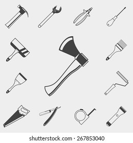 Set of construction tools monochrome icons. Hammer, spanner, screwdriver, pliers, axe, saw, brush, roller, spatula, razor, tape measure, flashlight.