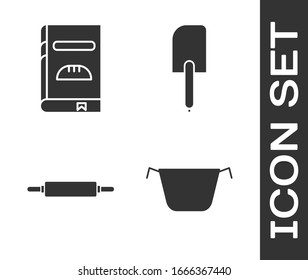 Set Cooking pot , Cookbook , Rolling pin  and Spatula  icon. Vector