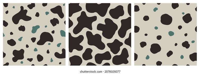 Set of Cow Skin Seamless Patterns. Hand Drawn vector illustration in Boho Style. Modern trend design background in Black and Green colors.