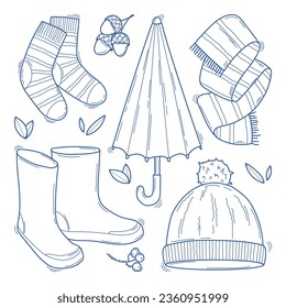 Clásico conjunto de acogedores elementos otoñales. Ilustración vectorial en blanco y negro de la ropa cálida al estilo de boceto aislada en fondo blanco