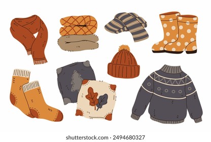 Set of cozy autumnal sweaters, scarves, socks, and warm accessories. Fall apparel clothes, cardigan, beanie kit. Vector hand drawn flat cartoon collection illustration