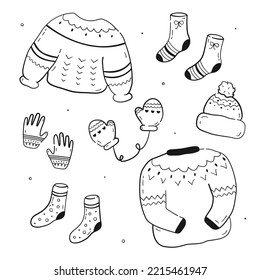 Set of cozy winter and autumn clothes in black linear drawing style. Cute hat, mittens, sweaters, socks and gloves. Vector illustration isolated on white background