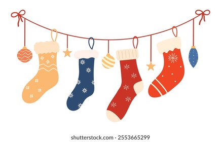 Set of cozy winter Christmas socks, hanging on a garland. Winter shoes with various holiday patterns. Collection of knitted wool and cotton socks with snowflakes isolated on a white background.