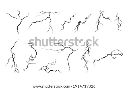 Set of cracks. Collection of different black lightning bolts. Earth crack. Set thunderstorm and lightning.Vector illustration of natural phenomena on white background.