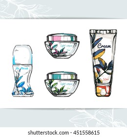 Set of cream tubes and bottles with leaf pattern