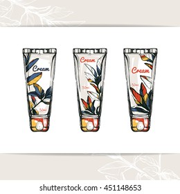 Set of cream tubes with leaves.