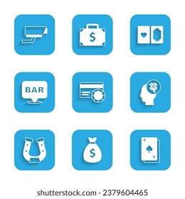 Set Credit card, Money bag, Playing with spades, Casino slot machine clover, Horseshoe, Alcohol bar location, Deck of playing cards and Security camera icon. Vector