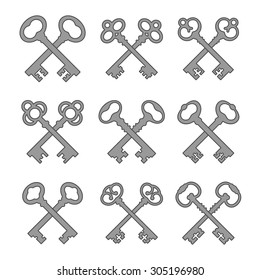 Set of the crossed keys of antique gray with dark gray stroke and isolated on a white background.