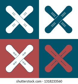 set of crossed snowboards with different schemes of binding mounting systems