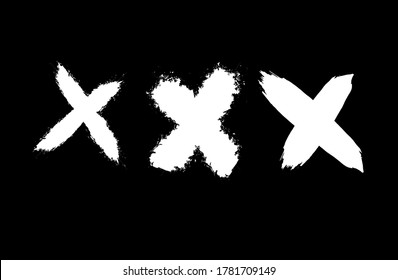 Set of crosses in grunge style. Paint strokes with a dry brush