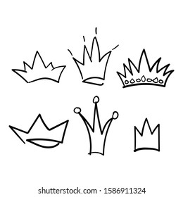 Set of crowns drawn by hand. Icon, doodle, scribble. Simple vector illustration.