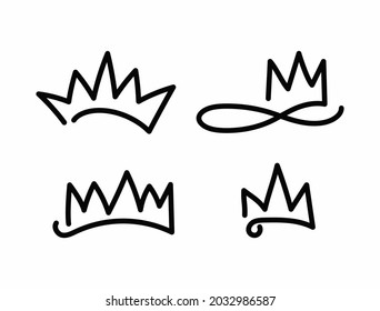 Set of crowns drawn by hand. Doodle, sketch. Simple vector illustration.