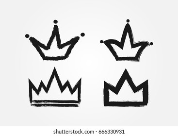 Set crowns drawn by hand and rough brush  Grunge  sketch  graffiti  Isolated black icons  logos  symbols  Vector illustration 