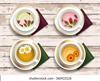 Set of cups of herbal tea. Wooden background