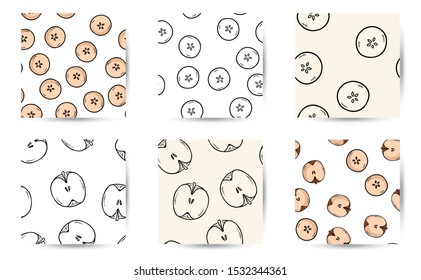 Set of cut in half apples natural drawn seamless patterns wallpapers. Collection of cartoon style decoration background tiles