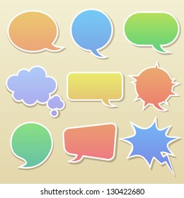 Set of cut from paper speech bubbles of different colors and shapes.