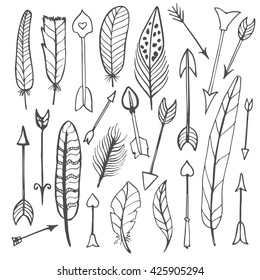 A set of cute arrows and feathers, hand drawn doodles