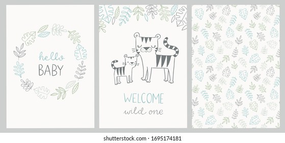 Set of cute baby shower cards and jungle pattern with tiger, tropical leaves, wreath and hand lettered phrases - hello baby, welcome wild one. For invitations, greeting cards, posters