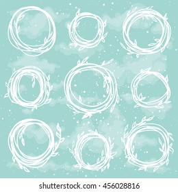 Set of cute branch wreath on sky background. Invitation template. Handsketched floral frames doodle collection, nature decor